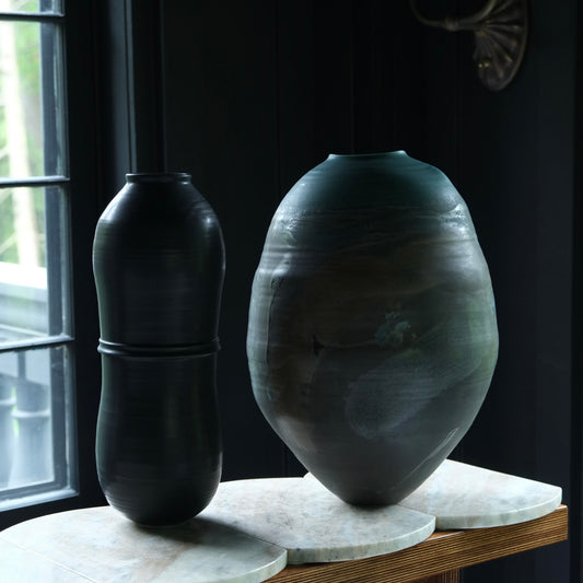Handmade sculptural ceramic vessel from the Earth, Moon, Magma Collection by EBW Ceramics with textured volcanic glaze and organic form