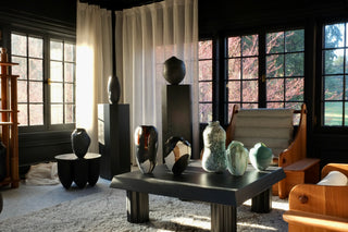 Modern interior with vases on a table